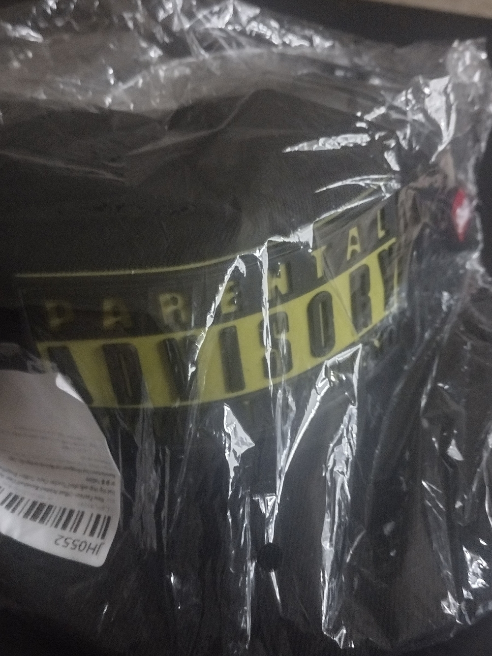 Black Graphic Hat with Yellow "Parental Advisory" Print $5